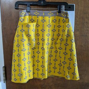 Yellow Anthropologie mini skirt (size M)